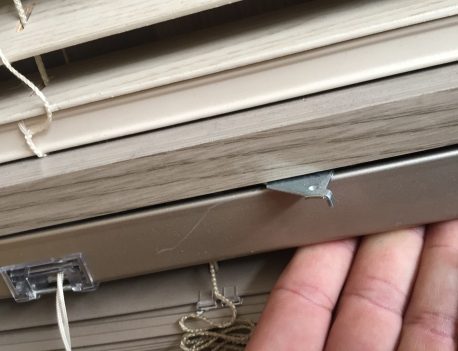 Bracket closed with the blind fixed in place