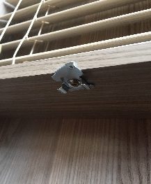 Venetian blind bracket in the open position
